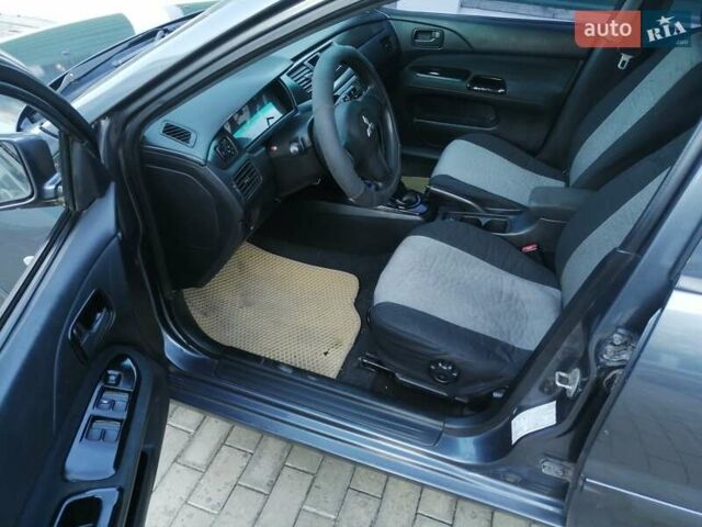 Сірий Міцубісі Lancer, об'ємом двигуна 1.6 л та пробігом 122 тис. км за 3500 $, фото 1 на Automoto.ua