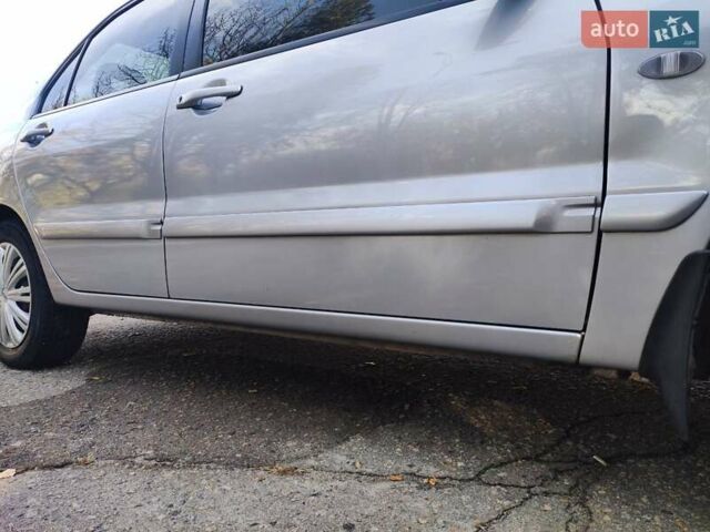 Сірий Міцубісі Lancer, об'ємом двигуна 1.58 л та пробігом 122 тис. км за 6300 $, фото 13 на Automoto.ua