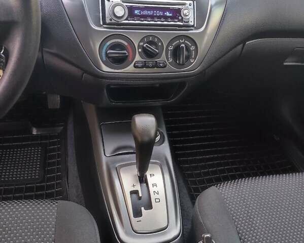 Сірий Міцубісі Lancer, об'ємом двигуна 1.58 л та пробігом 122 тис. км за 6300 $, фото 49 на Automoto.ua