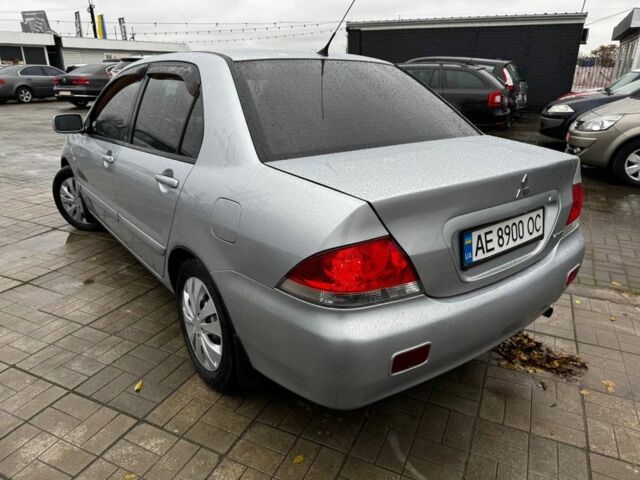 Серый Мицубиси Лансер, объемом двигателя 1.6 л и пробегом 205 тыс. км за 5300 $, фото 3 на Automoto.ua