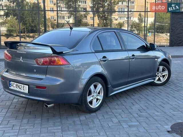 Сірий Міцубісі Lancer, об'ємом двигуна 2 л та пробігом 242 тис. км за 6300 $, фото 5 на Automoto.ua