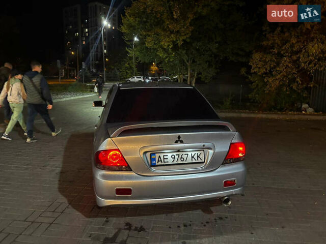 Сірий Міцубісі Lancer, об'ємом двигуна 1.6 л та пробігом 199 тис. км за 4000 $, фото 2 на Automoto.ua