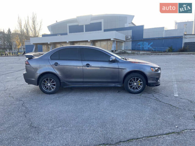 Серый Мицубиси Лансер, объемом двигателя 1.5 л и пробегом 224 тыс. км за 6300 $, фото 3 на Automoto.ua