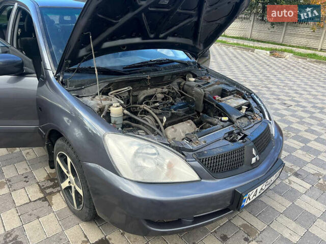 Міцубісі Lancer 2007 у Белой Церкве на Automoto.ua Сірий Міцубісі Lancer, об'ємом двигуна 1.58 л та пробігом 254 тис. км за 3200 $, фото 9 на Automoto.ua