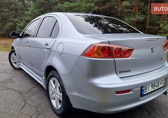 Серый Мицубиси Лансер, объемом двигателя 2 л и пробегом 213 тыс. км за 6550 $, фото 3 на Automoto.ua