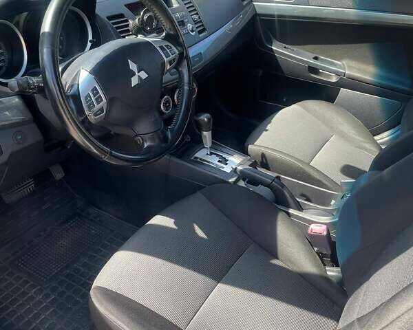 Сірий Міцубісі Lancer, об'ємом двигуна 2 л та пробігом 203 тис. км за 6500 $, фото 6 на Automoto.ua