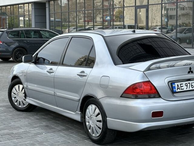 Сірий Міцубісі Lancer, об'ємом двигуна 1.6 л та пробігом 200 тис. км за 3900 $, фото 6 на Automoto.ua