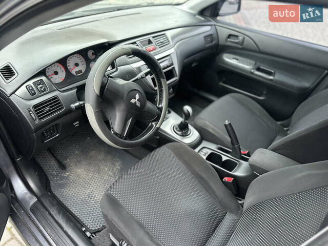 Сірий Міцубісі Lancer, об'ємом двигуна 1.6 л та пробігом 177 тис. км за 2800 $, фото 20 на Automoto.ua