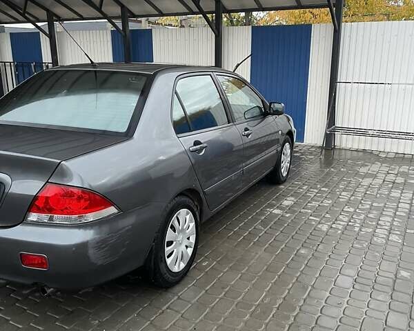Сірий Міцубісі Lancer, об'ємом двигуна 1.6 л та пробігом 330 тис. км за 3500 $, фото 15 на Automoto.ua