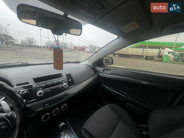 Серый Мицубиси Лансер, объемом двигателя 2 л и пробегом 286 тыс. км за 5800 $, фото 13 на Automoto.ua