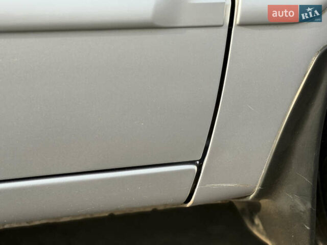 Серый Мицубиси Лансер, объемом двигателя 1.3 л и пробегом 160 тыс. км за 5555 $, фото 18 на Automoto.ua