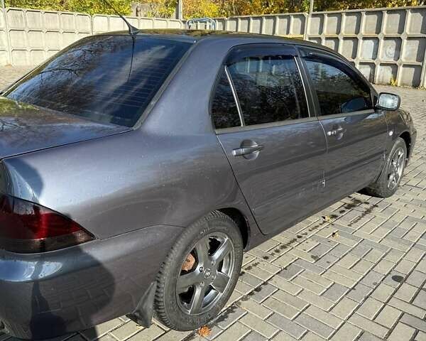 Мицубиси Лансер 2007 в Днепре (Днепропетровске) на Automoto.ua Серый Мицубиси Лансер, объемом двигателя 1.6 л и пробегом 220 тыс. км за 3500 $, фото 6 на Automoto.ua