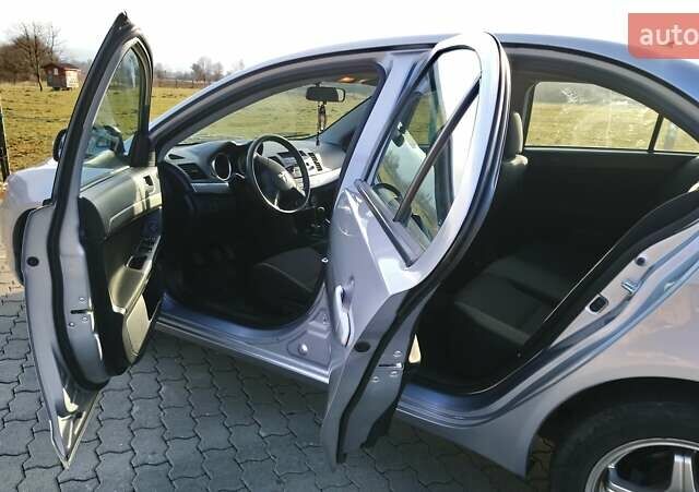Сірий Міцубісі Lancer, об'ємом двигуна 1.5 л та пробігом 270 тис. км за 5900 $, фото 12 на Automoto.ua