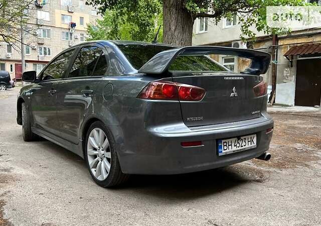 Сірий Міцубісі Lancer, об'ємом двигуна 2 л та пробігом 195 тис. км за 7600 $, фото 7 на Automoto.ua