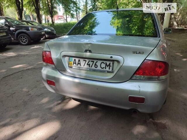 Сірий Міцубісі Lancer, об'ємом двигуна 0 л та пробігом 309 тис. км за 4500 $, фото 6 на Automoto.ua