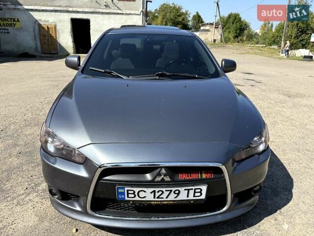 Сірий Міцубісі Lancer, об'ємом двигуна 2 л та пробігом 203 тис. км за 6200 $, фото 5 на Automoto.ua