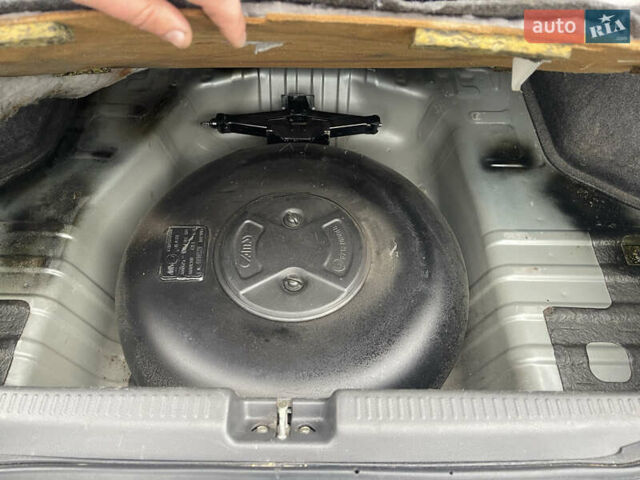 Серый Мицубиси Лансер, объемом двигателя 1.58 л и пробегом 205 тыс. км за 4750 $, фото 13 на Automoto.ua