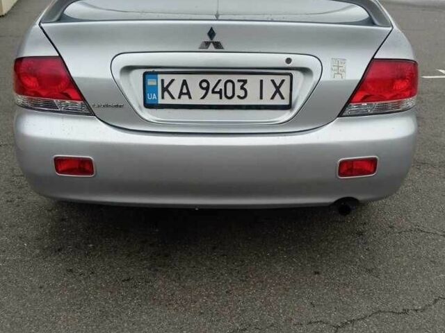 Сірий Міцубісі Lancer, об'ємом двигуна 1.6 л та пробігом 225 тис. км за 5500 $, фото 4 на Automoto.ua