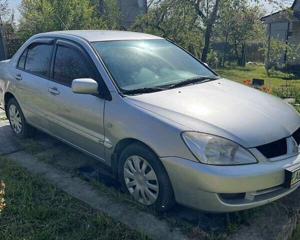 Сірий Міцубісі Lancer, об'ємом двигуна 1.6 л та пробігом 274 тис. км за 3700 $, фото 1 на Automoto.ua
