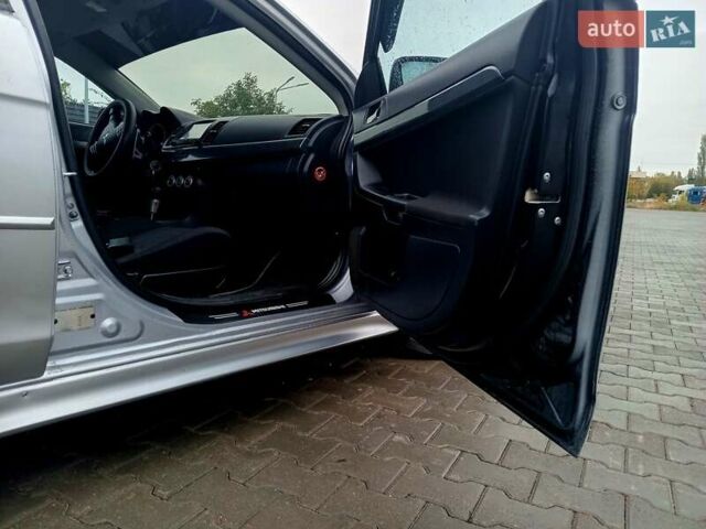 Сірий Міцубісі Lancer, об'ємом двигуна 2 л та пробігом 268 тис. км за 5555 $, фото 12 на Automoto.ua