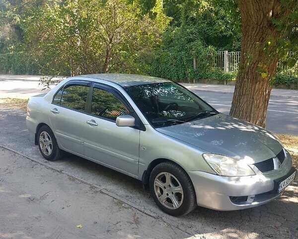 Серый Мицубиси Лансер, объемом двигателя 0 л и пробегом 236 тыс. км за 4500 $, фото 2 на Automoto.ua