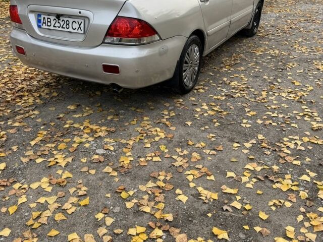 Сірий Міцубісі Lancer, об'ємом двигуна 1.6 л та пробігом 180 тис. км за 2500 $, фото 3 на Automoto.ua