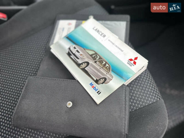 Сірий Міцубісі Lancer, об'ємом двигуна 1.6 л та пробігом 177 тис. км за 2800 $, фото 36 на Automoto.ua