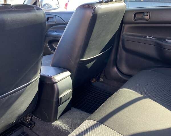 Сірий Міцубісі Lancer, об'ємом двигуна 1.6 л та пробігом 293 тис. км за 5000 $, фото 17 на Automoto.ua