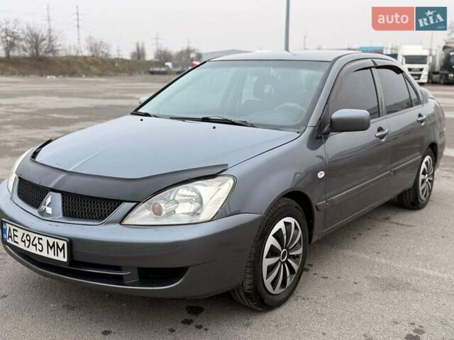 Сірий Міцубісі Lancer, об'ємом двигуна 1.6 л та пробігом 270 тис. км за 4300 $, фото 3 на Automoto.ua