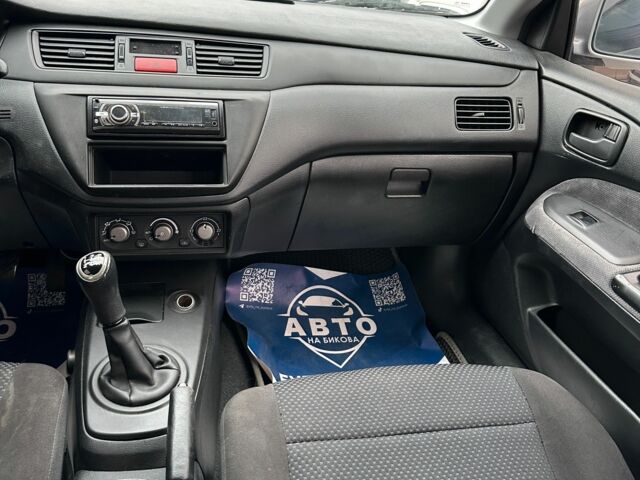 Серый Мицубиси Лансер, объемом двигателя 1.6 л и пробегом 280 тыс. км за 4600 $, фото 4 на Automoto.ua