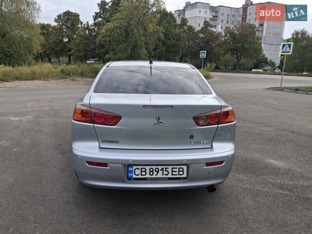 Серый Мицубиси Лансер, объемом двигателя 1.5 л и пробегом 235 тыс. км за 5000 $, фото 5 на Automoto.ua