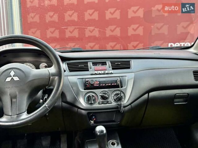 Сірий Міцубісі Lancer, об'ємом двигуна 1.6 л та пробігом 395 тис. км за 4900 $, фото 20 на Automoto.ua