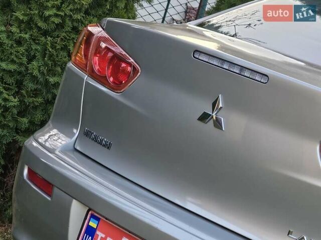 Серый Мицубиси Лансер, объемом двигателя 2 л и пробегом 282 тыс. км за 5450 $, фото 39 на Automoto.ua