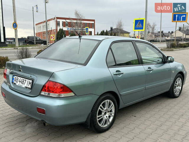 Сірий Міцубісі Lancer, об'ємом двигуна 1.6 л та пробігом 116 тис. км за 5199 $, фото 10 на Automoto.ua