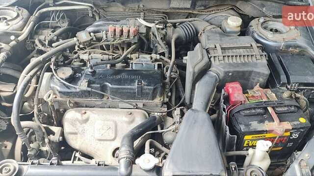 Сірий Міцубісі Lancer, об'ємом двигуна 1.6 л та пробігом 234 тис. км за 4500 $, фото 9 на Automoto.ua