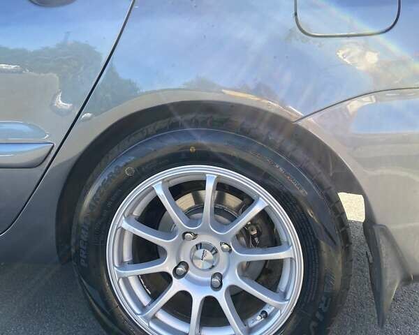 Сірий Міцубісі Lancer, об'ємом двигуна 1.6 л та пробігом 293 тис. км за 5000 $, фото 21 на Automoto.ua