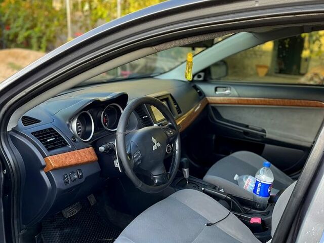 Сірий Міцубісі Lancer, об'ємом двигуна 2 л та пробігом 290 тис. км за 6500 $, фото 7 на Automoto.ua