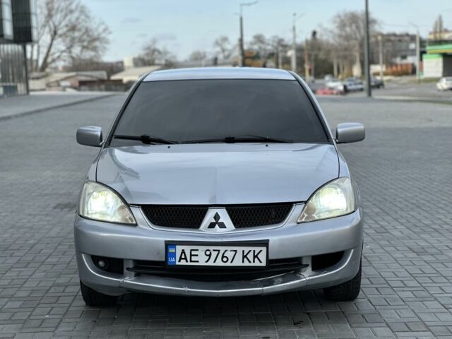 Сірий Міцубісі Lancer, об'ємом двигуна 1.6 л та пробігом 200 тис. км за 3900 $, фото 3 на Automoto.ua