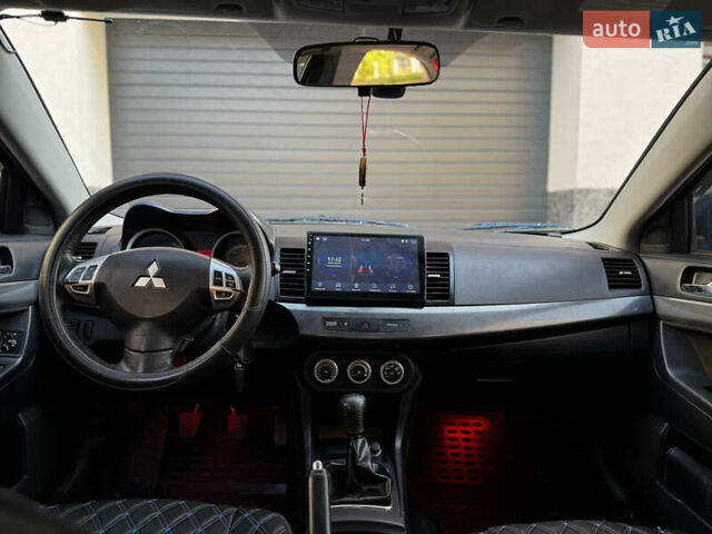 Сірий Міцубісі Lancer, об'ємом двигуна 2 л та пробігом 173 тис. км за 6800 $, фото 25 на Automoto.ua