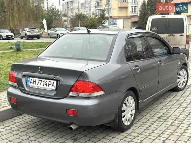 Сірий Міцубісі Lancer, об'ємом двигуна 1.6 л та пробігом 177 тис. км за 2800 $, фото 6 на Automoto.ua