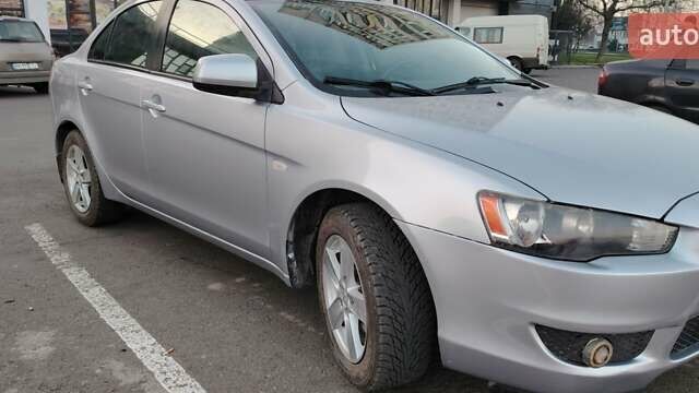 Серый Мицубиси Лансер, объемом двигателя 1.5 л и пробегом 201 тыс. км за 5600 $, фото 4 на Automoto.ua
