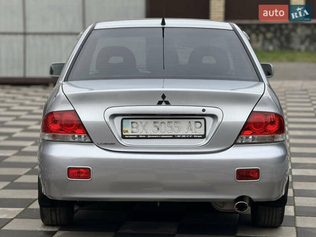 Сірий Міцубісі Lancer, об'ємом двигуна 1.6 л та пробігом 281 тис. км за 3999 $, фото 11 на Automoto.ua