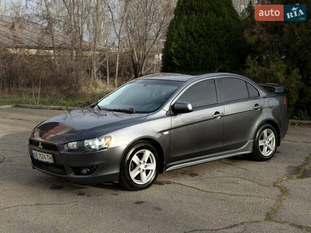 Сірий Міцубісі Lancer, об'ємом двигуна 2 л та пробігом 220 тис. км за 6800 $, фото 6 на Automoto.ua