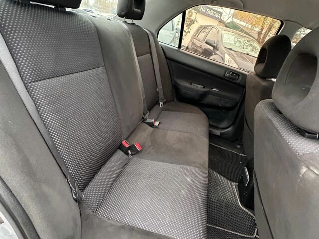 Серый Мицубиси Лансер, объемом двигателя 1.6 л и пробегом 280 тыс. км за 4600 $, фото 2 на Automoto.ua