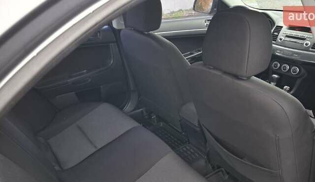 Серый Мицубиси Лансер, объемом двигателя 2 л и пробегом 189 тыс. км за 6800 $, фото 11 на Automoto.ua