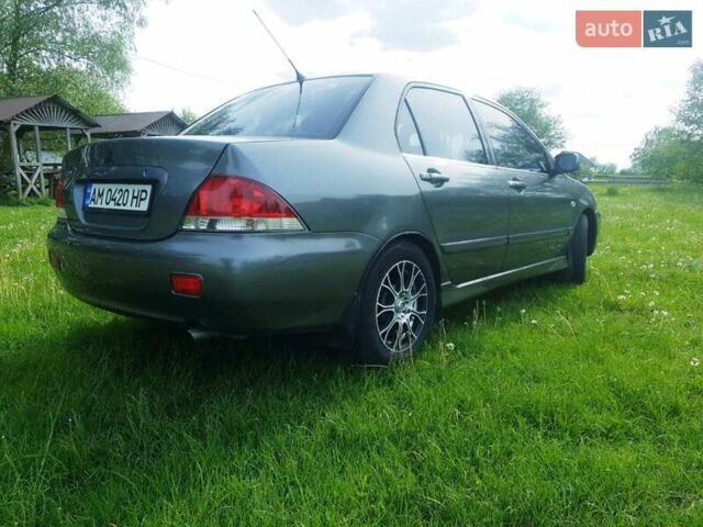 Сірий Міцубісі Lancer, об'ємом двигуна 1.58 л та пробігом 220 тис. км за 4500 $, фото 5 на Automoto.ua