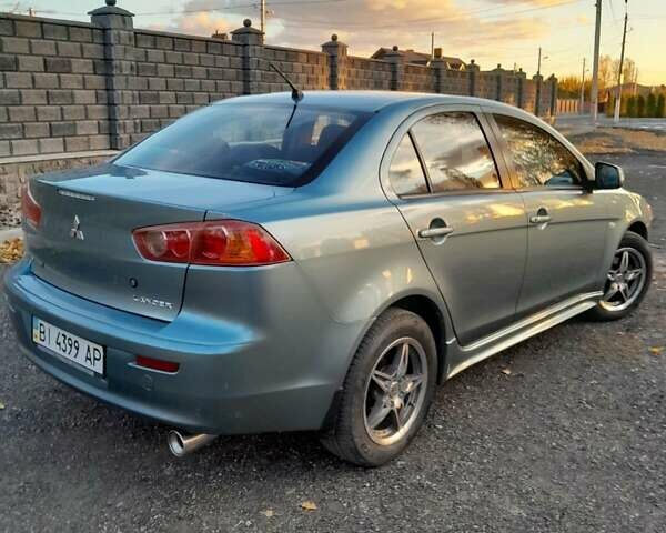 Сірий Міцубісі Lancer, об'ємом двигуна 2 л та пробігом 167 тис. км за 7100 $, фото 1 на Automoto.ua