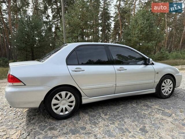 Серый Мицубиси Лансер, объемом двигателя 1.6 л и пробегом 200 тыс. км за 4400 $, фото 7 на Automoto.ua