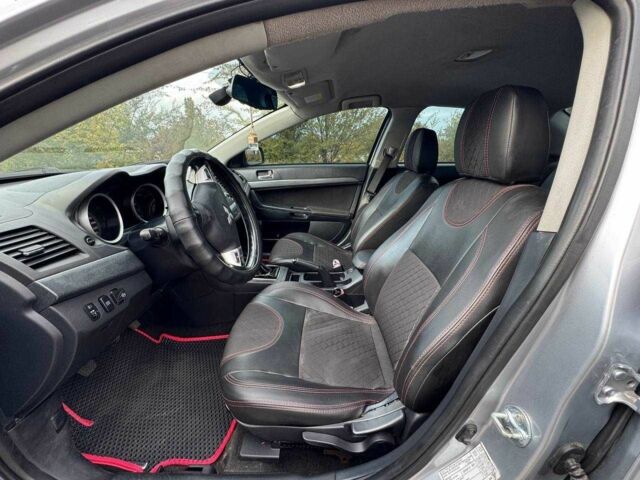 Серый Мицубиси Лансер, объемом двигателя 2 л и пробегом 207 тыс. км за 5800 $, фото 12 на Automoto.ua