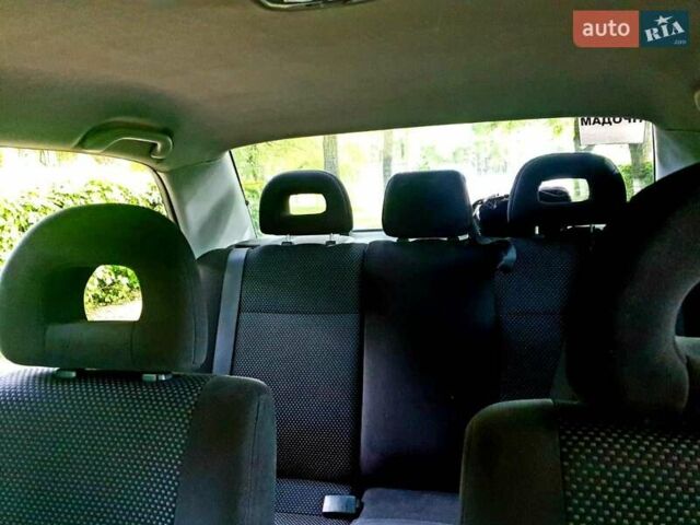 Сірий Міцубісі Lancer, об'ємом двигуна 1.58 л та пробігом 220 тис. км за 4500 $, фото 4 на Automoto.ua
